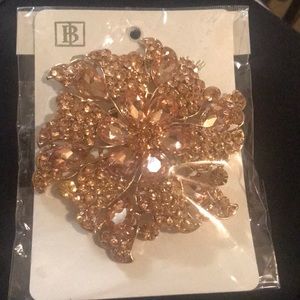 Selling a Rose Gold Brooch.
